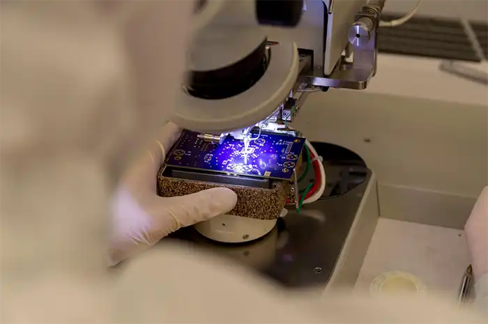 Detailed close-up of K&S ICONN PLUS wire bonder capillary assembly